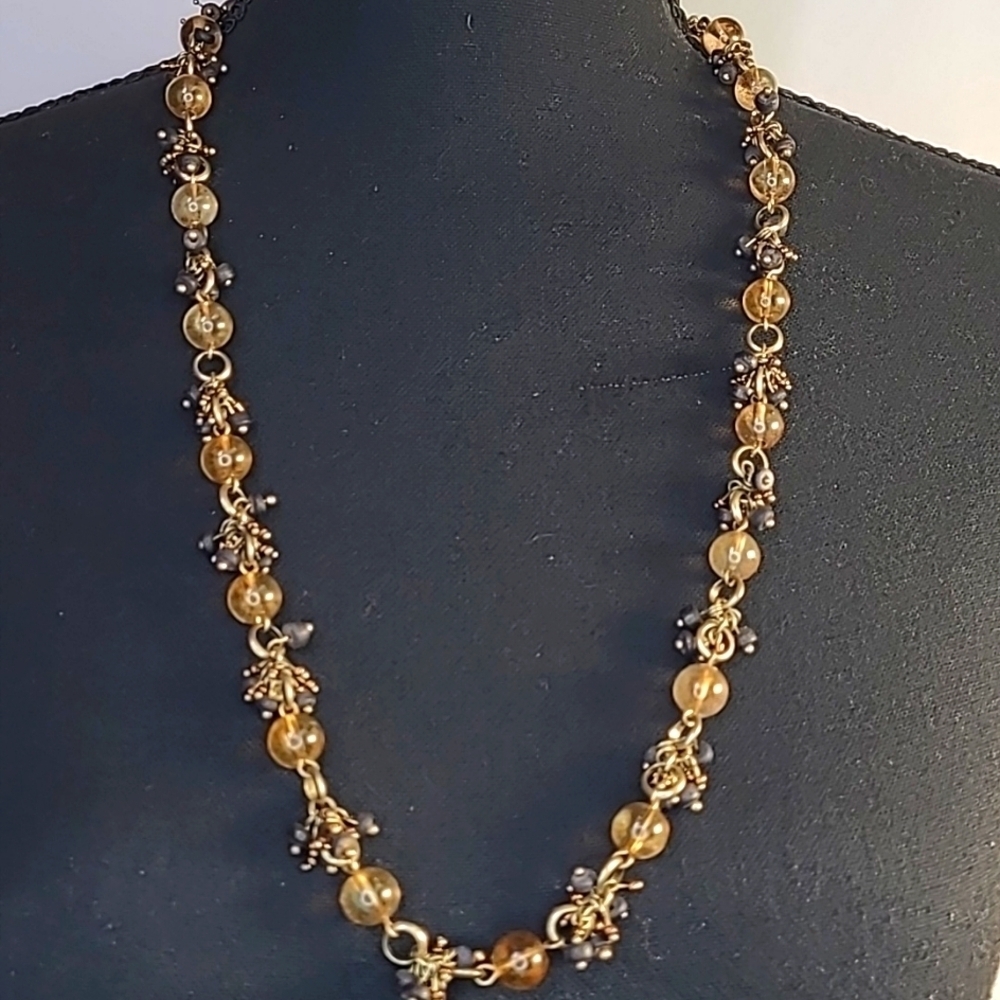 Necklace black and amber beads. Gold plated. Full length approximately 28".
